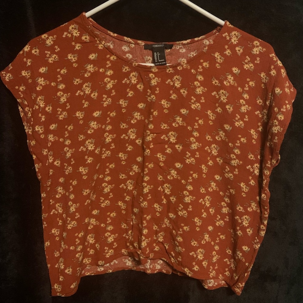 Red/orange blouse with flowers